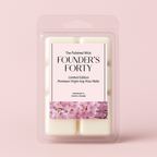Pack of 'Founder's Forty' wax melts with cherry blossom design on a pink background