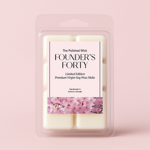 Pack of 'Founder's Forty' wax melts with cherry blossom design on a pink background