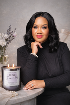 Portrait of Casey Nicole Armstrong, creator of the Lit From Within podcast, photographed in an elegant black ensemble with a poised and confident expression.


