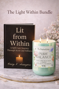 Book titled 'Lit from Within' and a candle labeled 'Pure Balance' on a marble surface.