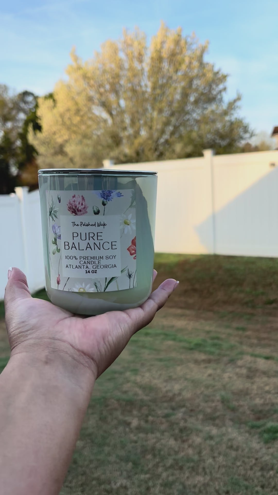 The pure balance candle is being outdoors and enjoying life